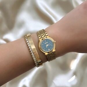 AUTHENTIC VINTAGE GUCCI DIAMOND CUT BEZEL GOLD WATCH